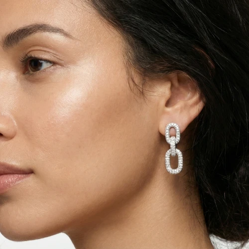 Boucle d'oreille or blanc et diamant